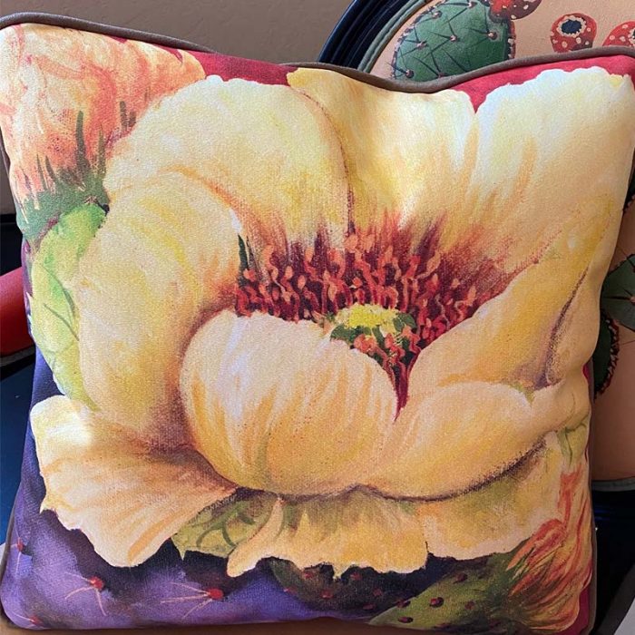 accent pillow with pastel yellow flower