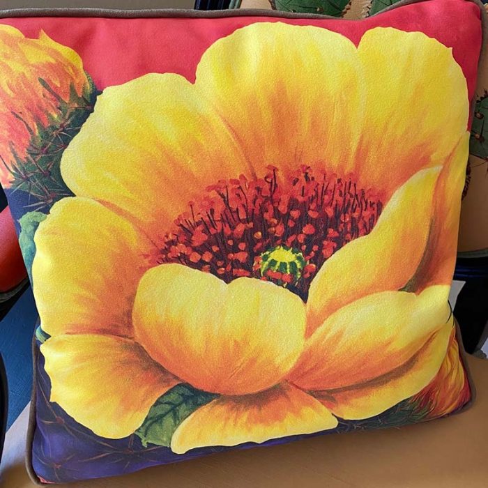 accent pillow with bright yellow flower